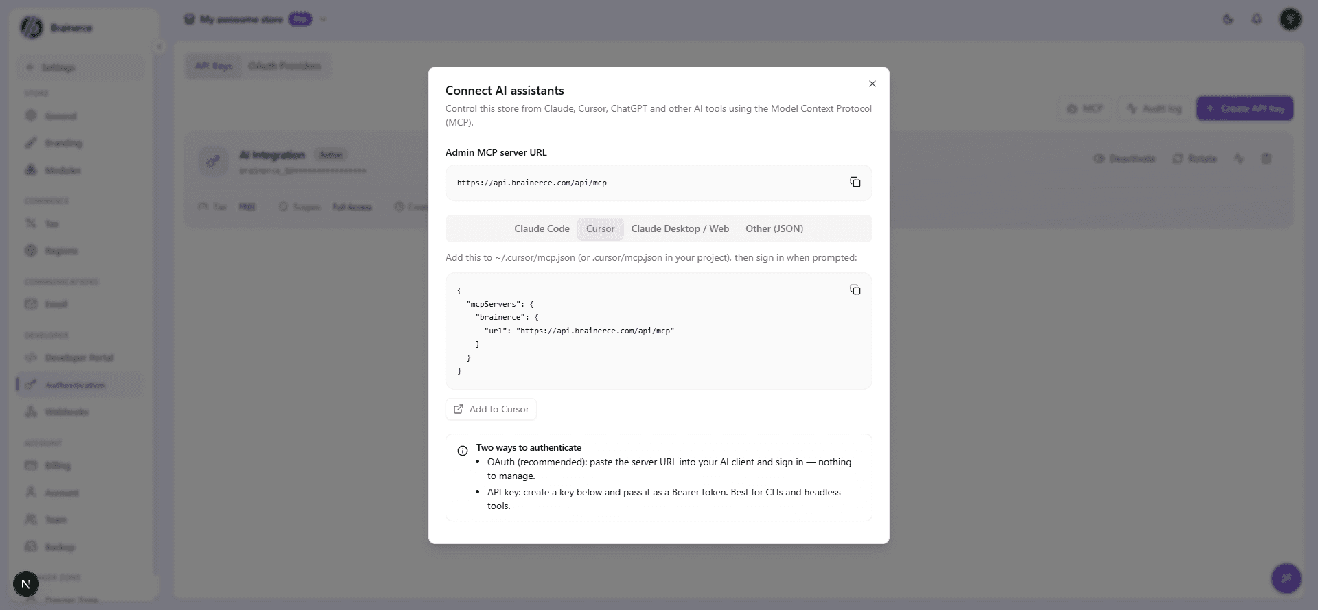 The Cursor tab of the Connect AI assistants dialog, showing the mcp.json snippet and the Add to Cursor button